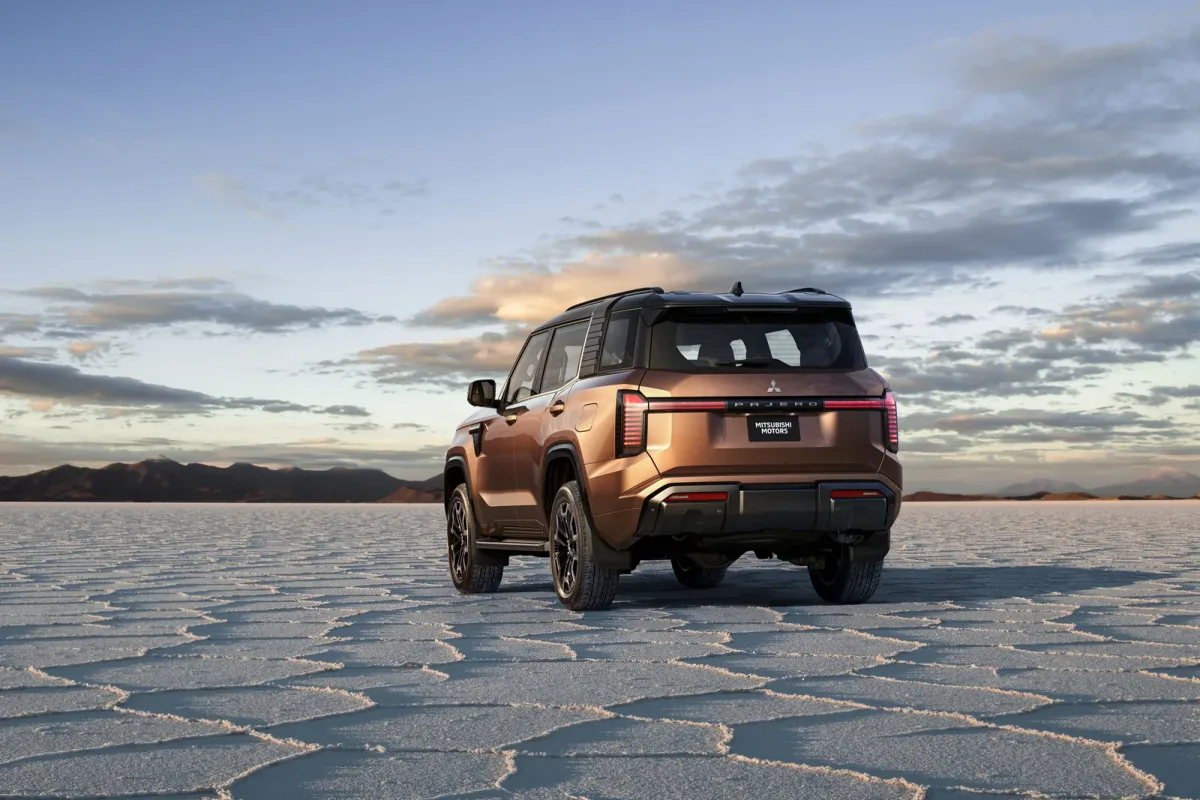 The all-new Mitsubishi Pajero photographed from the rear three-quarter on a salt flat