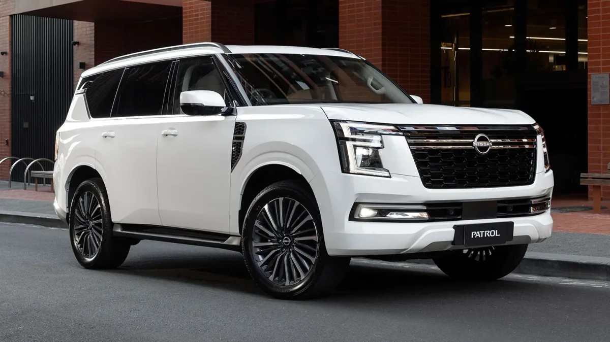 Nissan Patrol Y63 in white, front three-quarter view